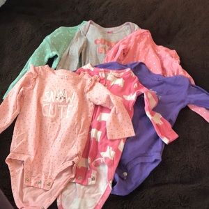 Six long sleeve onesies